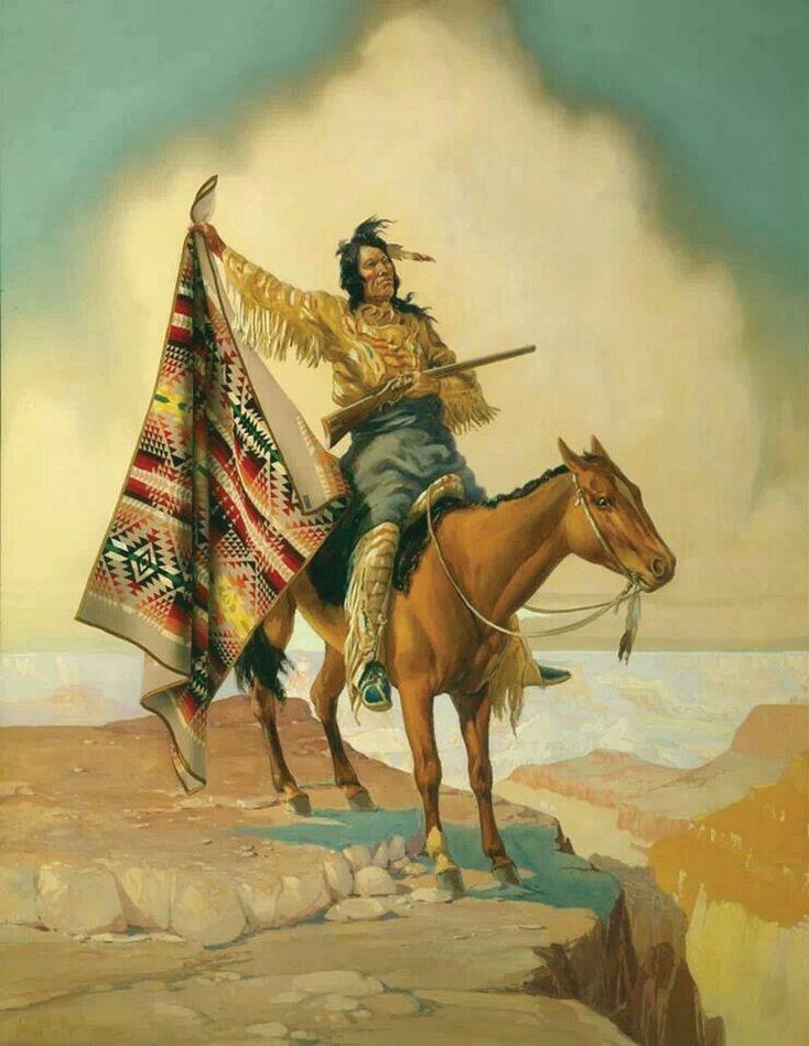 A native wearing American Indian Blankets and riding a horse