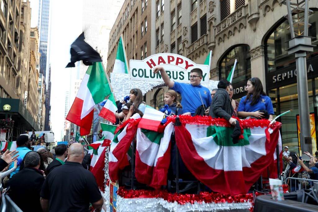 Attractive parade on Columbus Day for Americans
