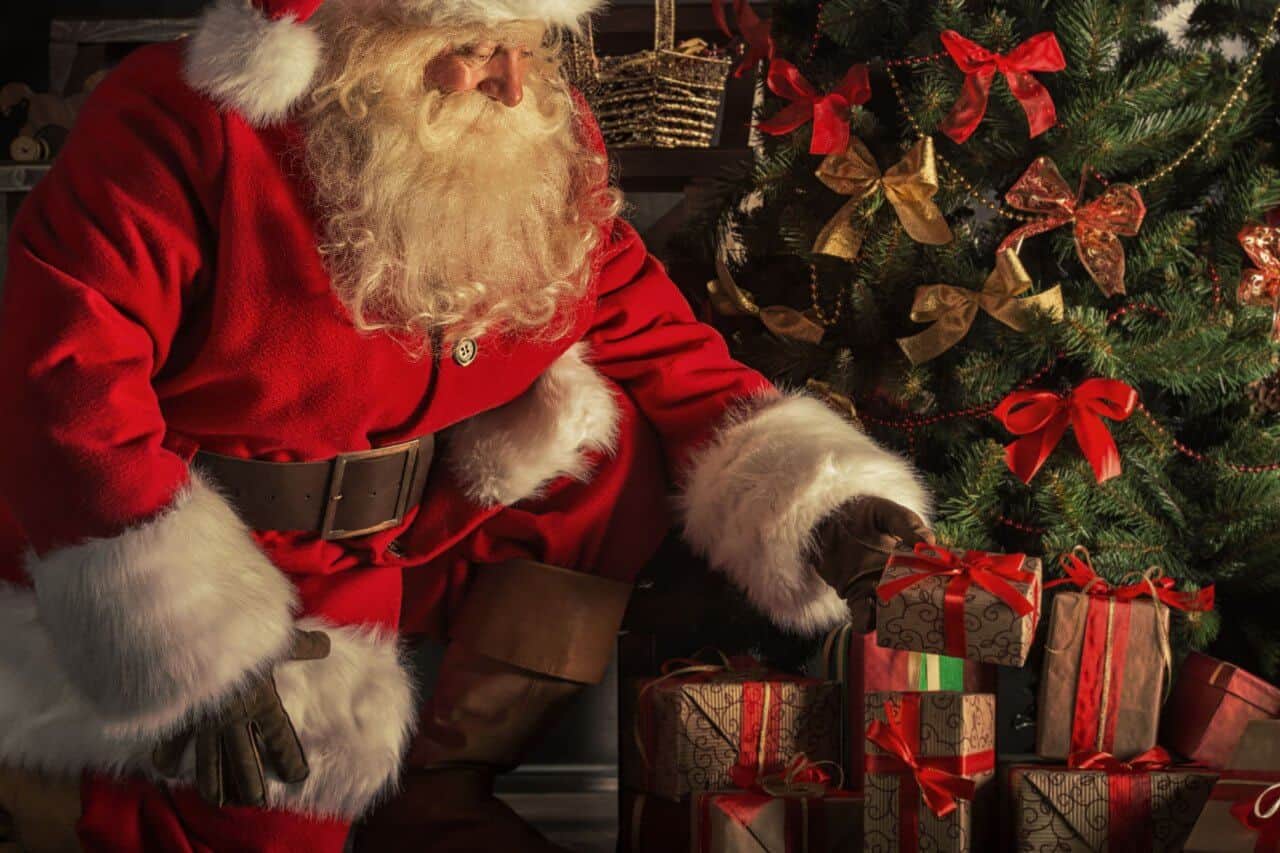 Santa Claus Christmas Eve giving presents 