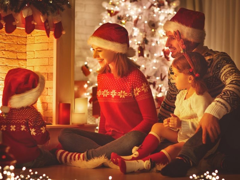 family Christmas next to fireplace traditions Christmas Sweatshirt 